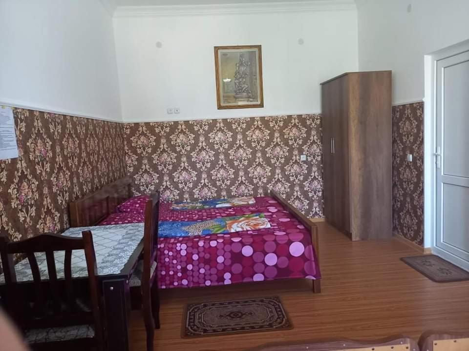 Postel nebo postele na pokoji v ubytování Guest House Fazisi