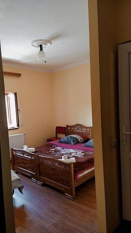 Postel nebo postele na pokoji v ubytování Teo Guesthouse and Camping in Mestia