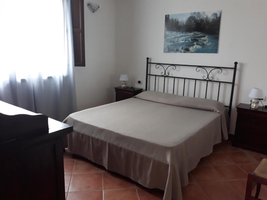Postel nebo postele na pokoji v ubytování Borgo Venecca