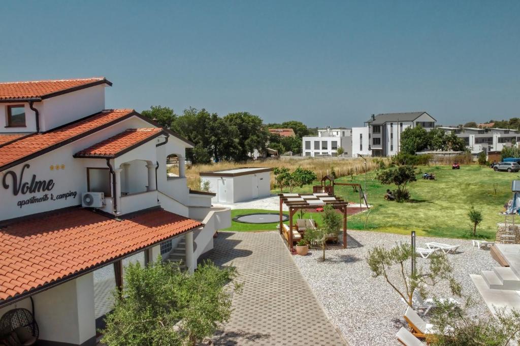 a view from the roof of a house with a yard at Camping Volme in Banjole