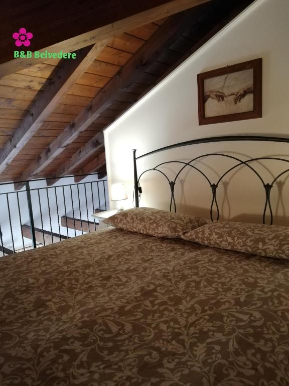 Postel nebo postele na pokoji v ubytování B&B Belvedere