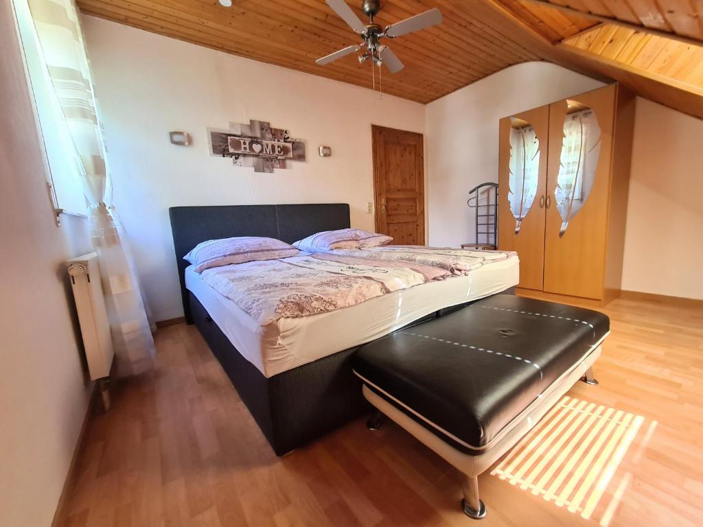 Postel nebo postele na pokoji v ubytování Holzfeld