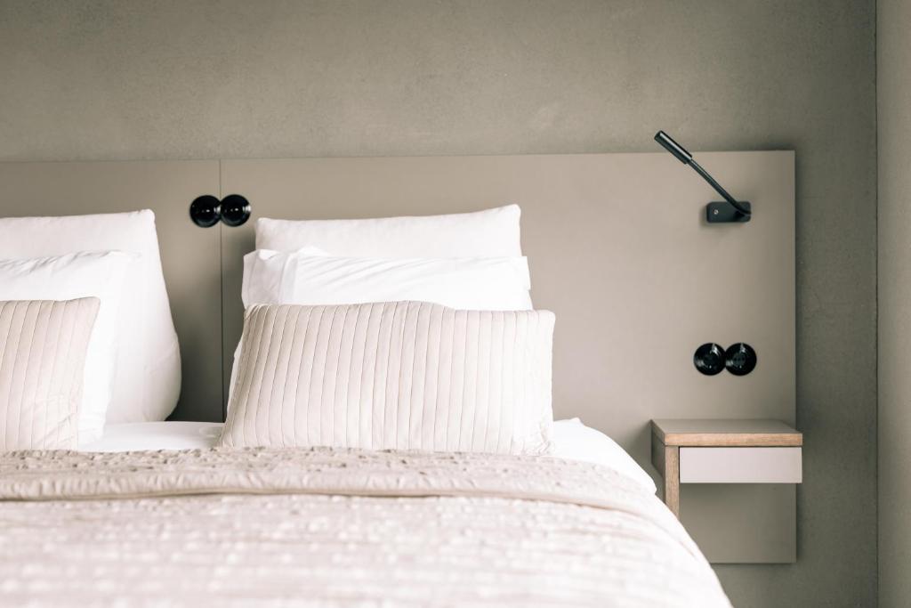 Postel nebo postele na pokoji v ubytování Asgard Hotel