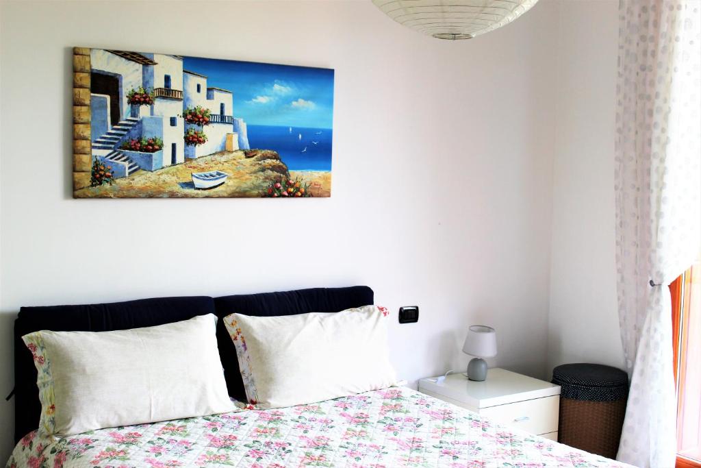 A bed or beds in a room at Appartemento Stella