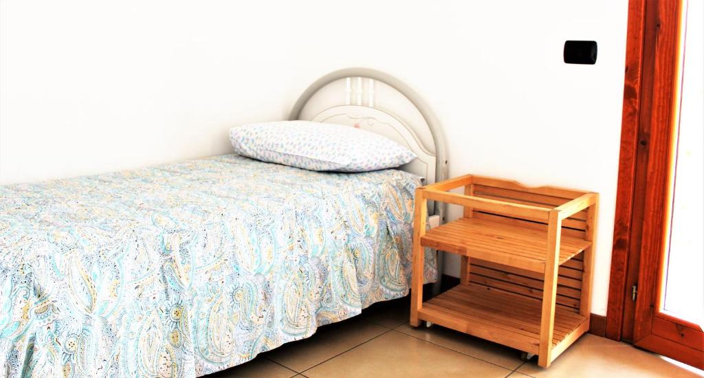 A bed or beds in a room at Appartemento Stella