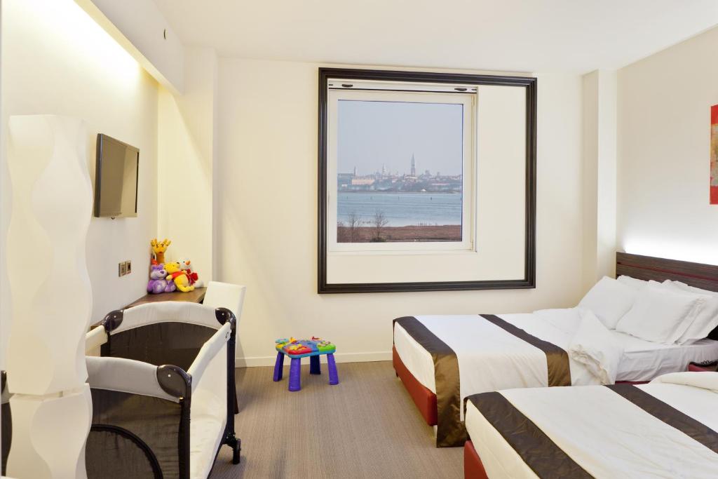 Postel nebo postele na pokoji v ubytování Antony Hotel - Venice Airport