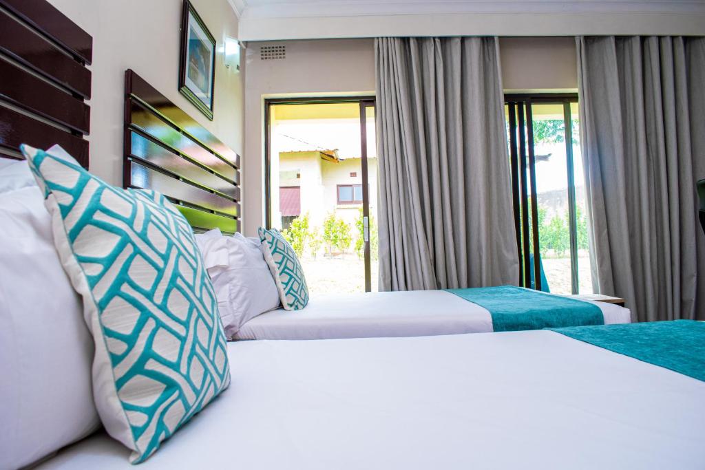 Douglas Lodge & Apartmentsにあるベッド