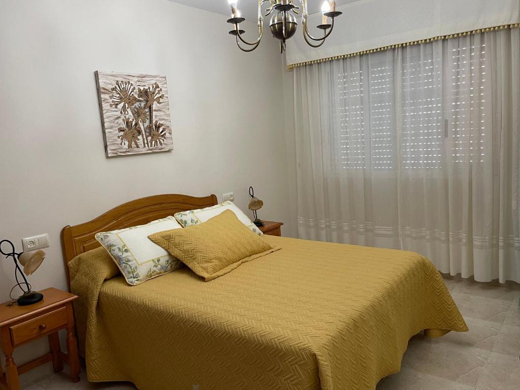 Llit o llits en una habitació de Piso O cruceiro 2