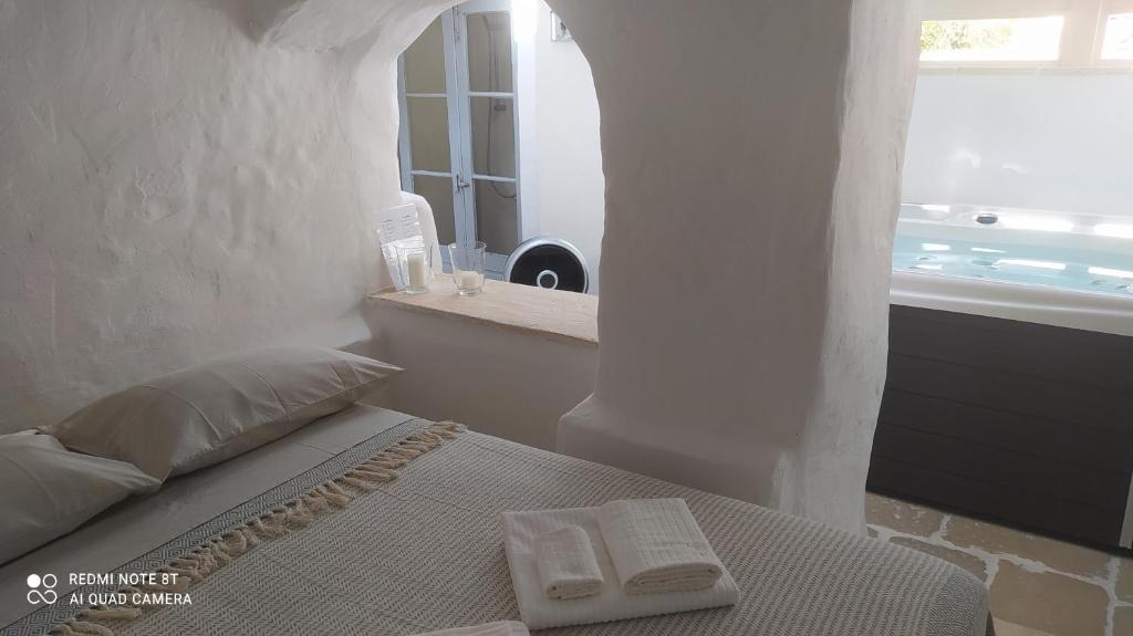 Postel nebo postele na pokoji v ubytování Il Rifugio Luxury House & Spa