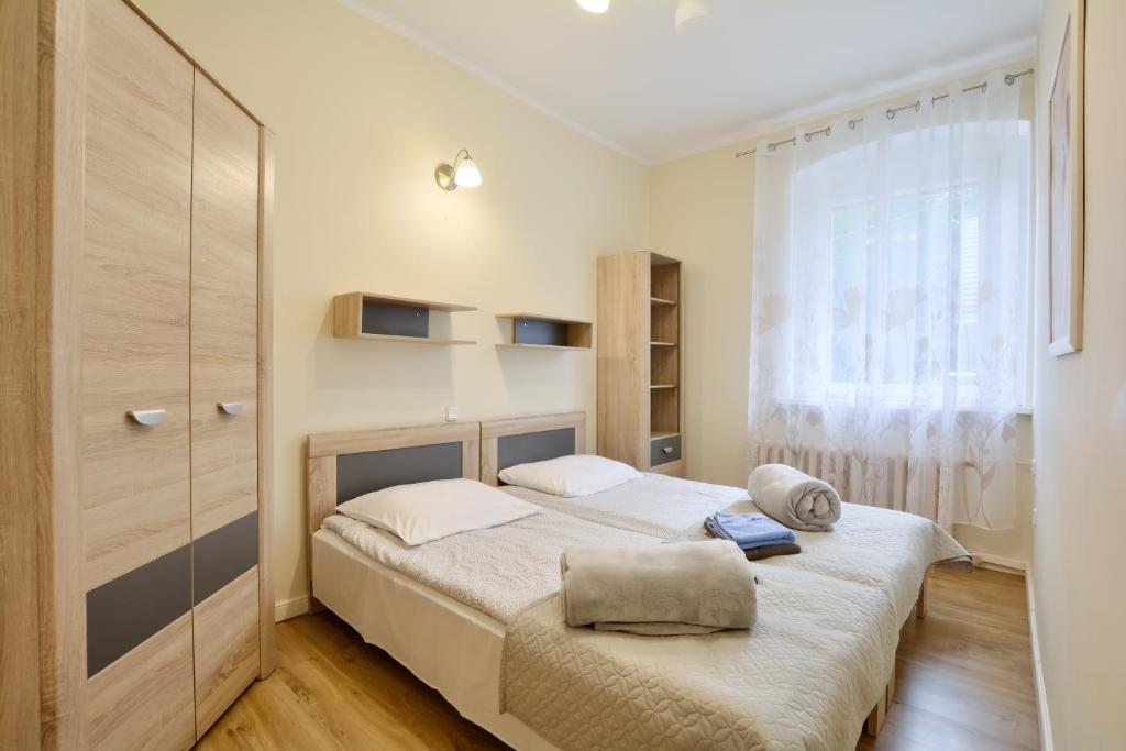 Postel nebo postele na pokoji v ubytování Willa Rozalia
