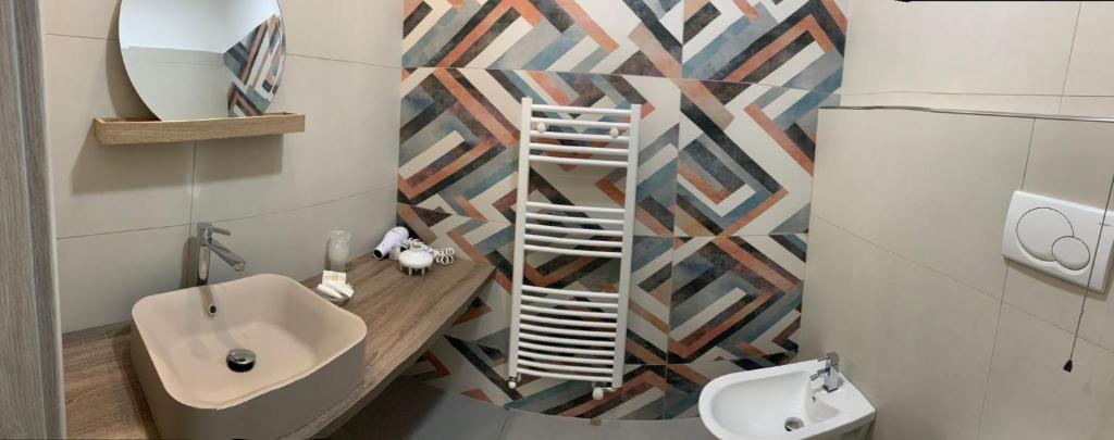 Koupelna v ubytování Albergo Piazza Risorgimento