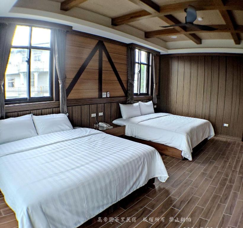 Postel nebo postele na pokoji v ubytování Gaodiyuan Tea B&B 高帝園茶業民宿