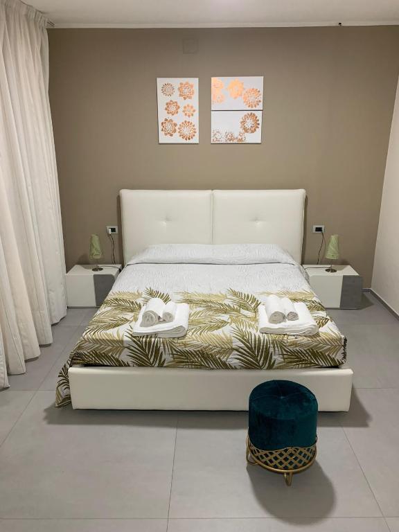 Postel nebo postele na pokoji v ubytování Albergo Piazza Risorgimento