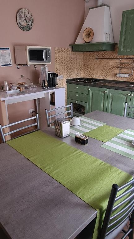Kuchyň nebo kuchyňský kout v ubytování B&B Regina