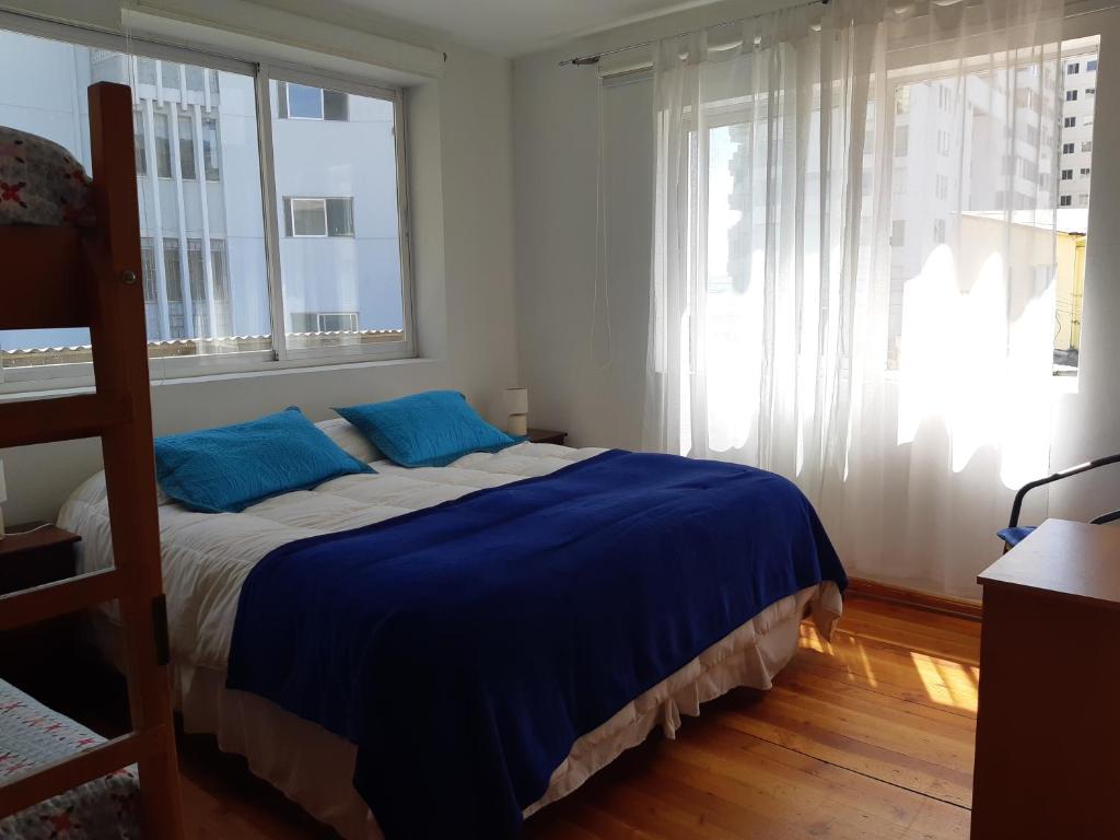 Postel nebo postele na pokoji v ubytování Hostal Magnolio