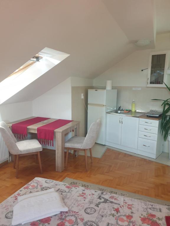 Kuchyň nebo kuchyňský kout v ubytování Apartment Loft
