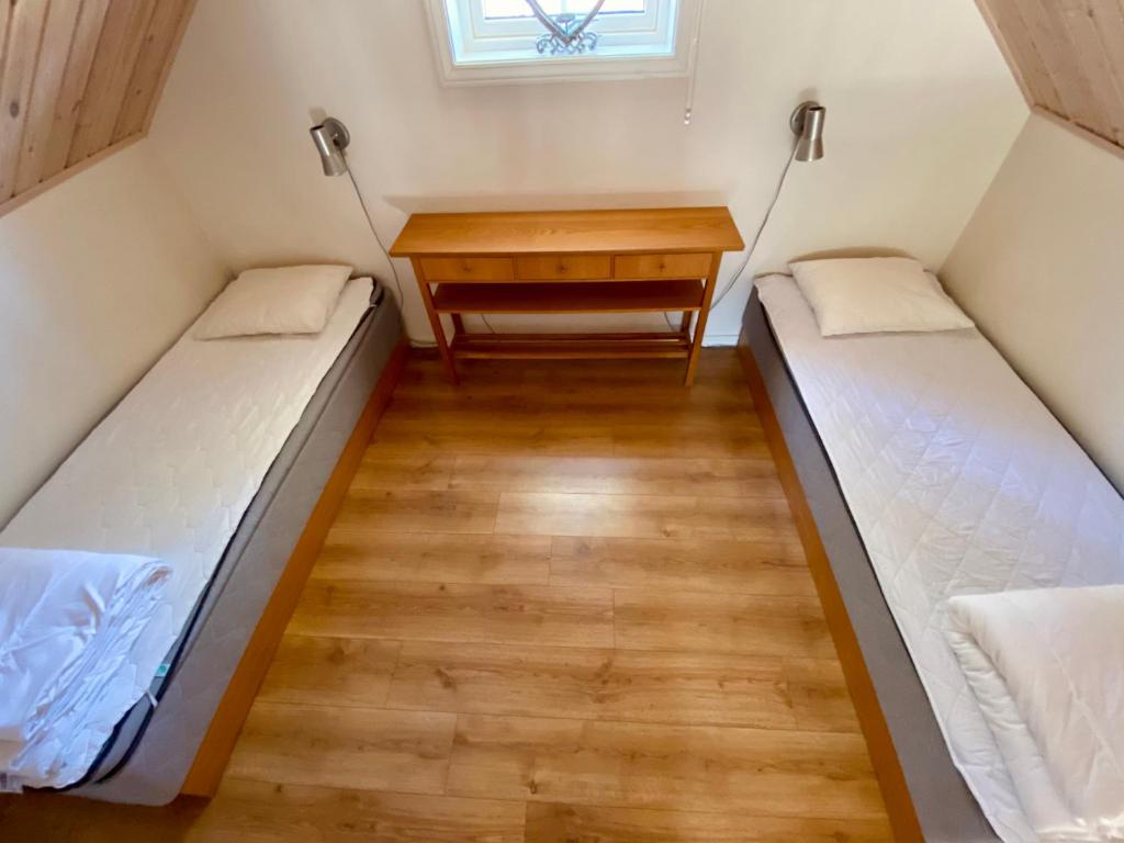 Postel nebo postele na pokoji v ubytování Falun Strandby Främby Udde