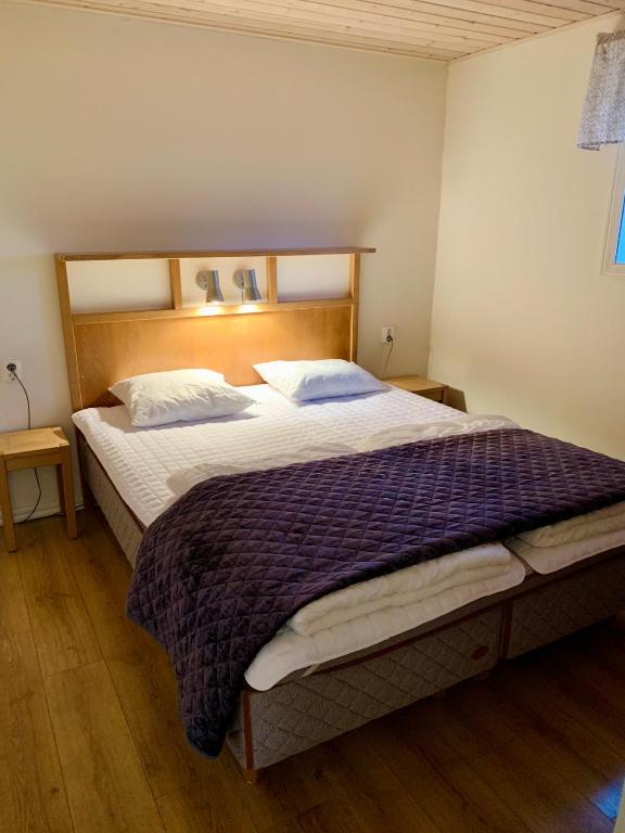 Postel nebo postele na pokoji v ubytování Falun Strandby Främby Udde