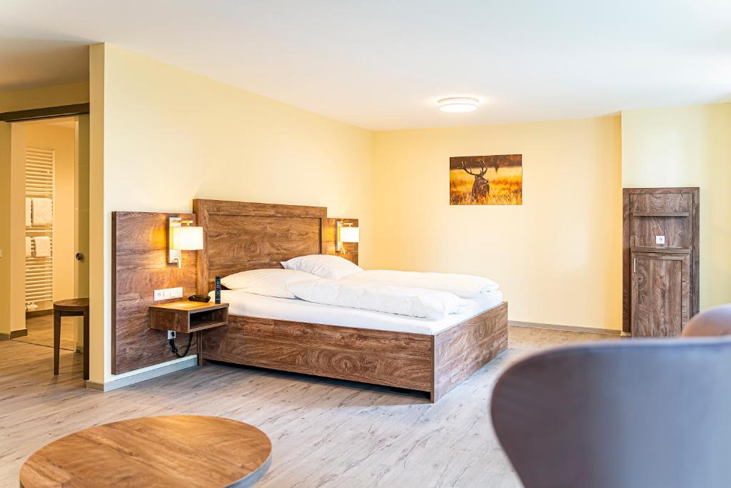 Postel nebo postele na pokoji v ubytování Robenstein Aktivhotel & SPA