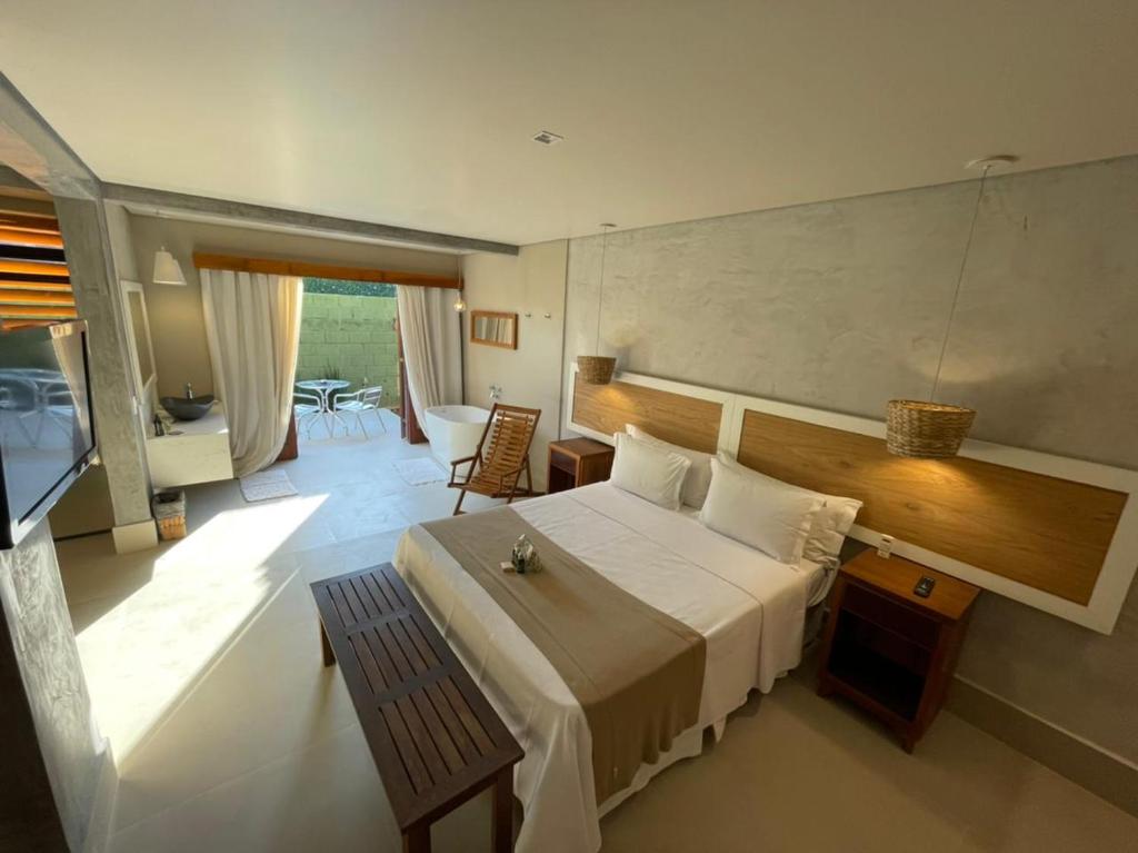 Cama ou camas em um quarto em Hiu Hotel