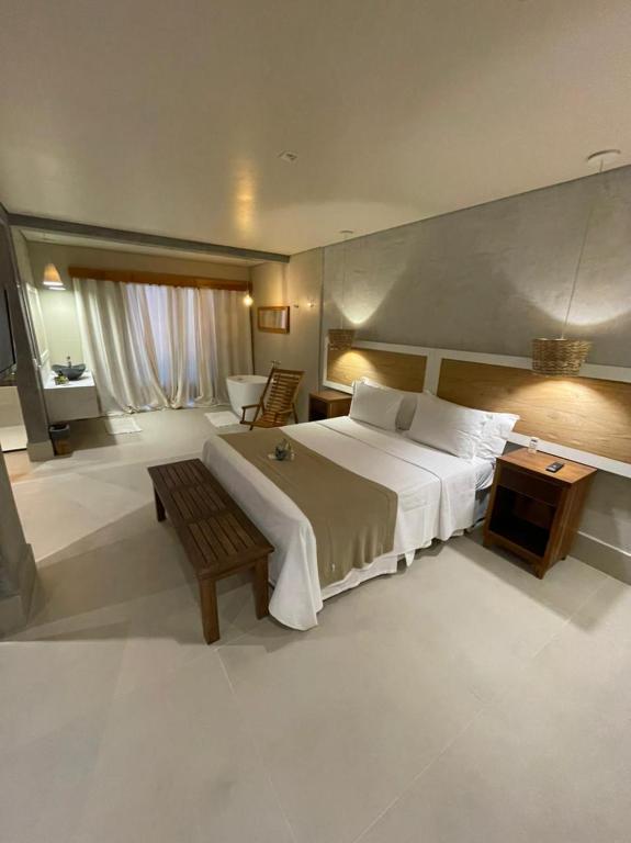 Cama ou camas em um quarto em Hiu Hotel