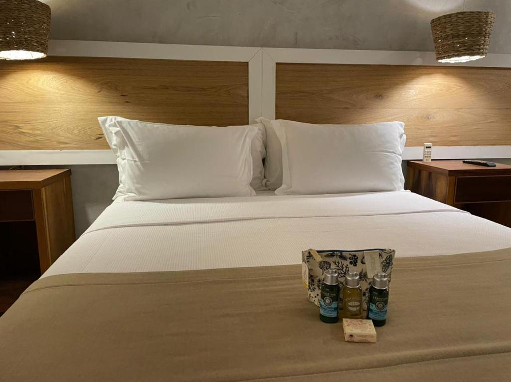 Cama ou camas em um quarto em Hiu Hotel
