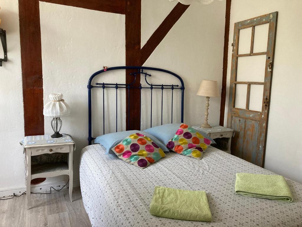 Postel nebo postele na pokoji v ubytování Entre Mer et Pins