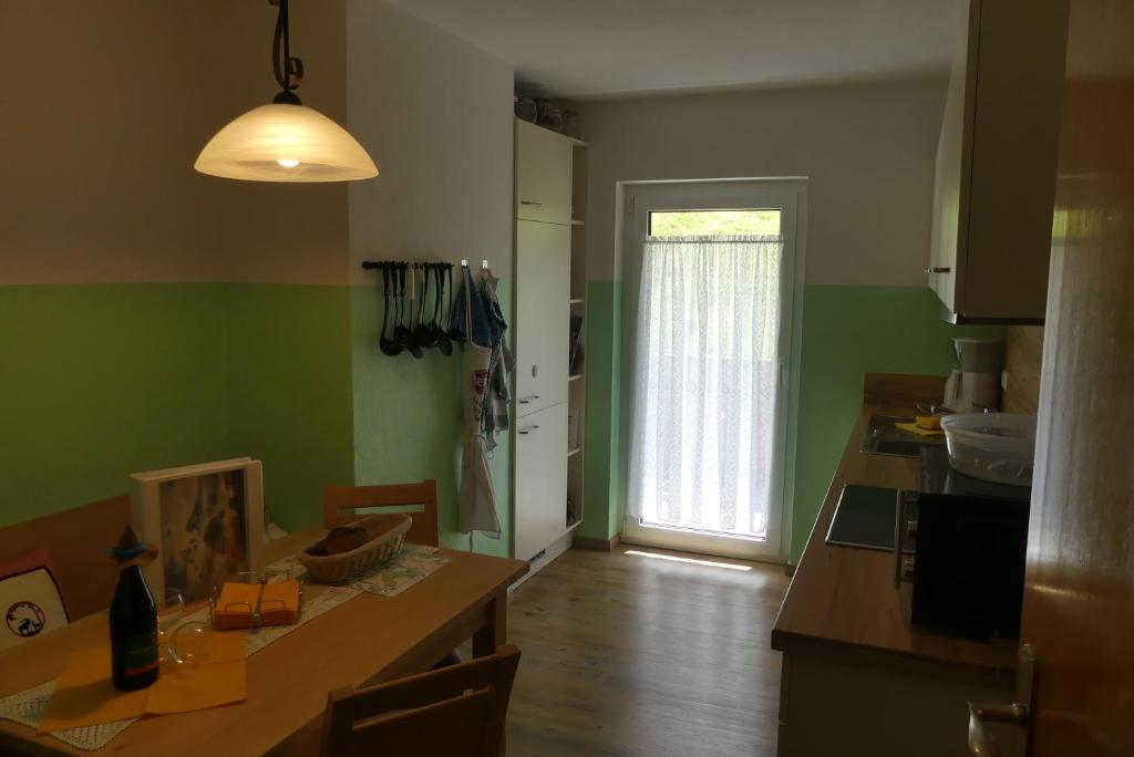 Kuchyň nebo kuchyňský kout v ubytování Ferienwohnungen Haus Kunterbunt