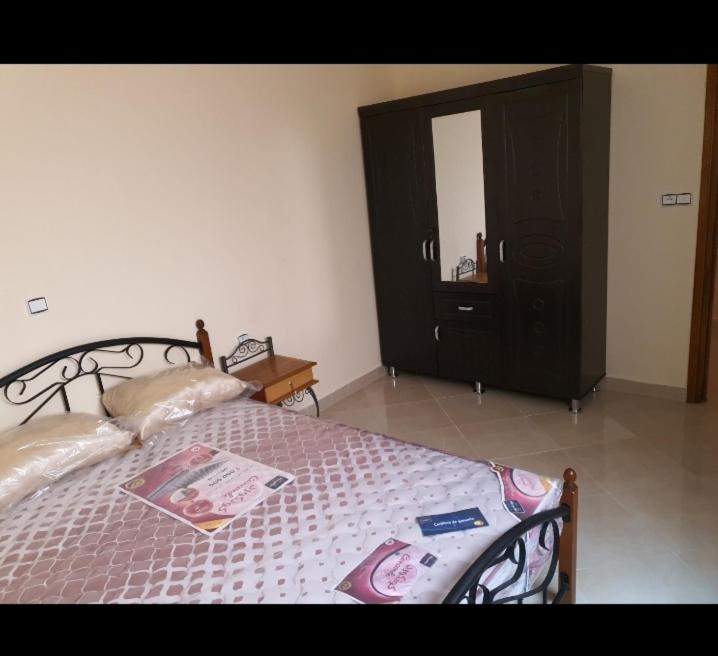 Postel nebo postele na pokoji v ubytování Nieuwbouw appartementen al hoceima