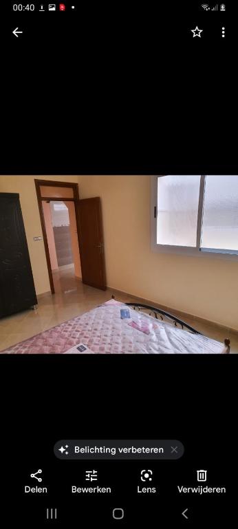 Postel nebo postele na pokoji v ubytování Nieuwbouw appartementen al hoceima