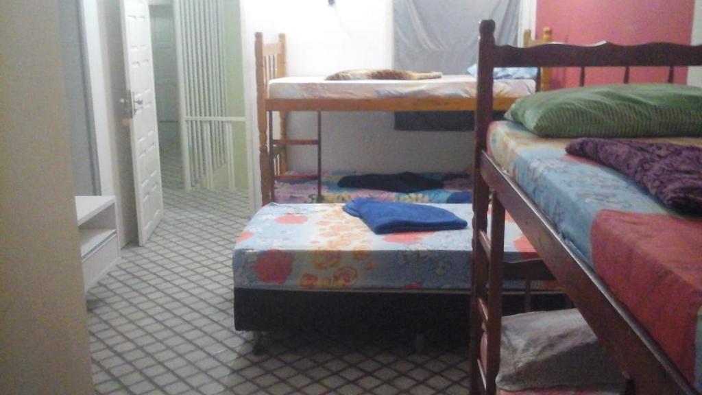 Postel nebo postele na pokoji v ubytování Hostel da Paz