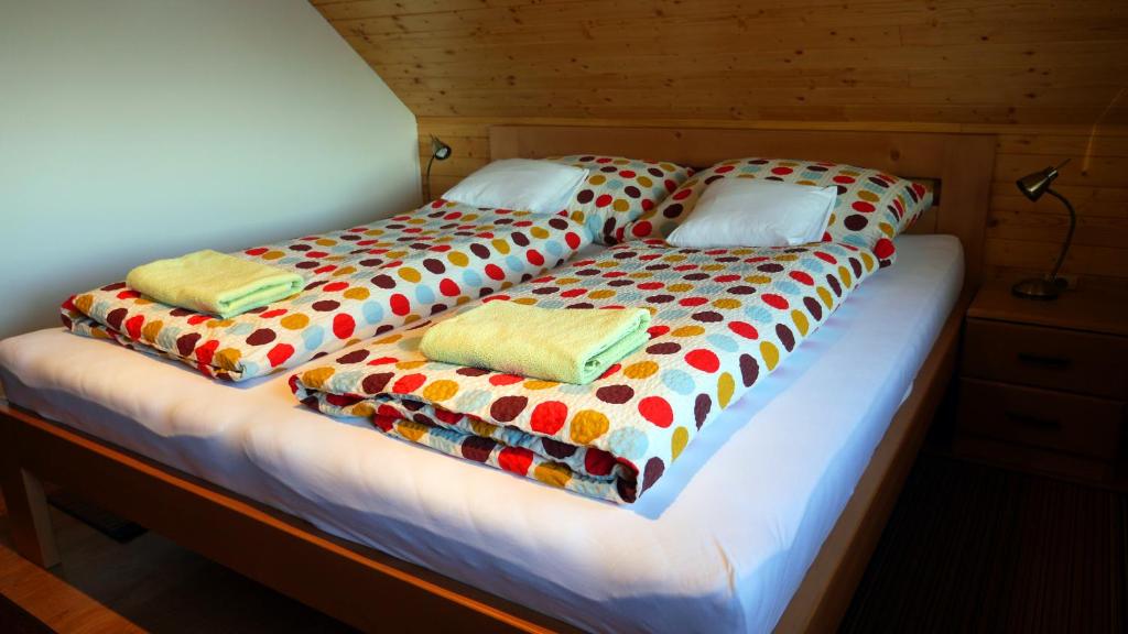 Posteľ alebo postele v izbe v ubytovaní Apartmány Vista