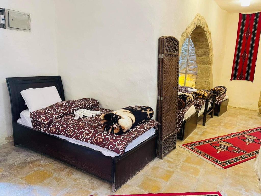 Postel nebo postele na pokoji v ubytování Dana Tower Hotel