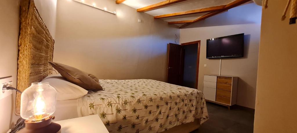 Postel nebo postele na pokoji v ubytování Casa-Grima