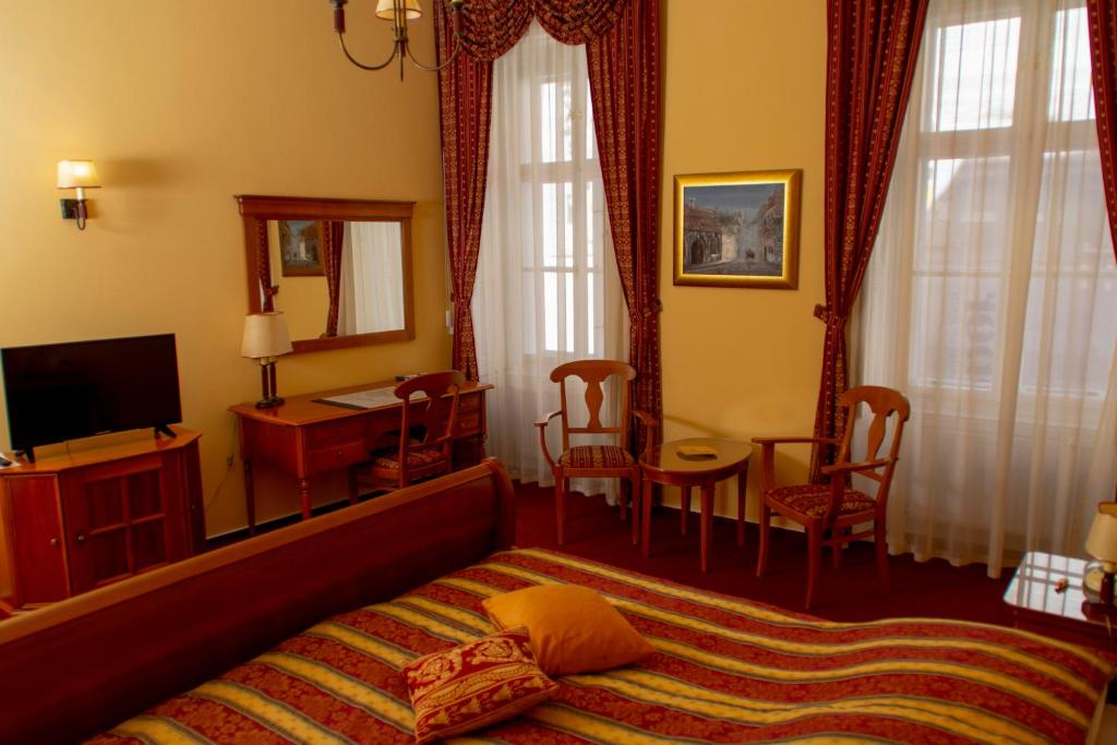 TV a/nebo společenská místnost v ubytování Hotel Wollner