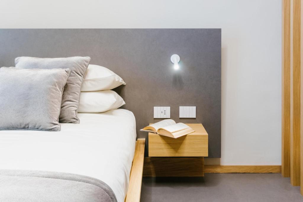 Voodi või voodid majutusasutuse ETNEA Suite 270 toas