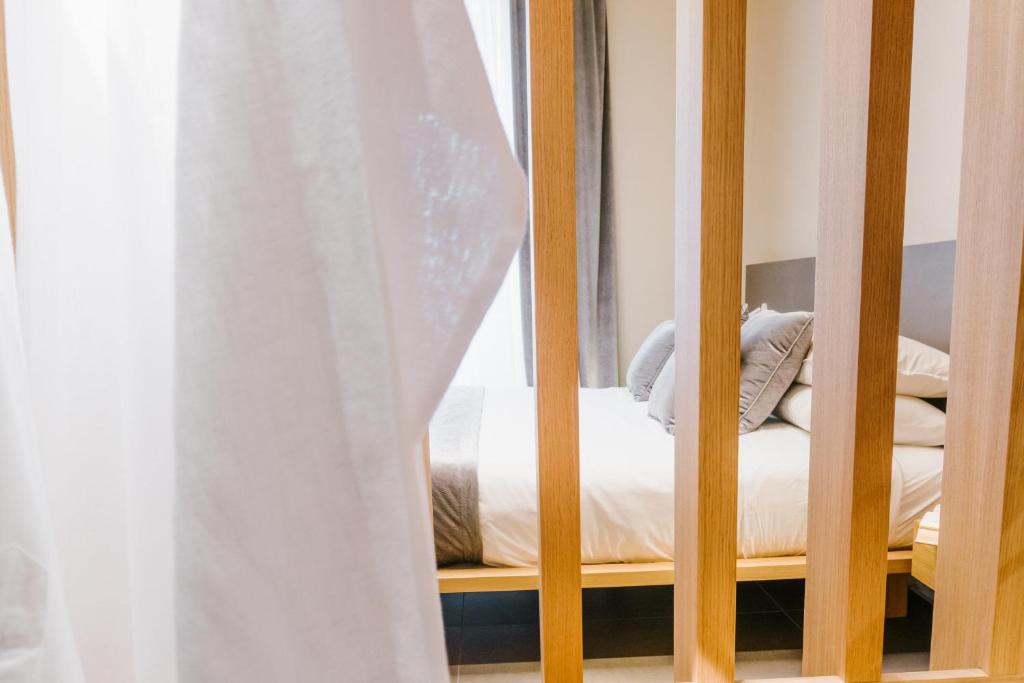 Voodi või voodid majutusasutuse ETNEA Suite 270 toas
