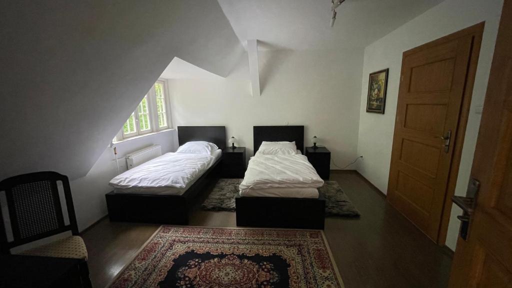 Postel nebo postele na pokoji v ubytování Villa ANSER