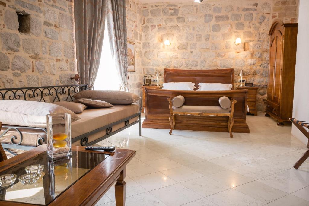 Postel nebo postele na pokoji v ubytování Hotel Villa Duomo
