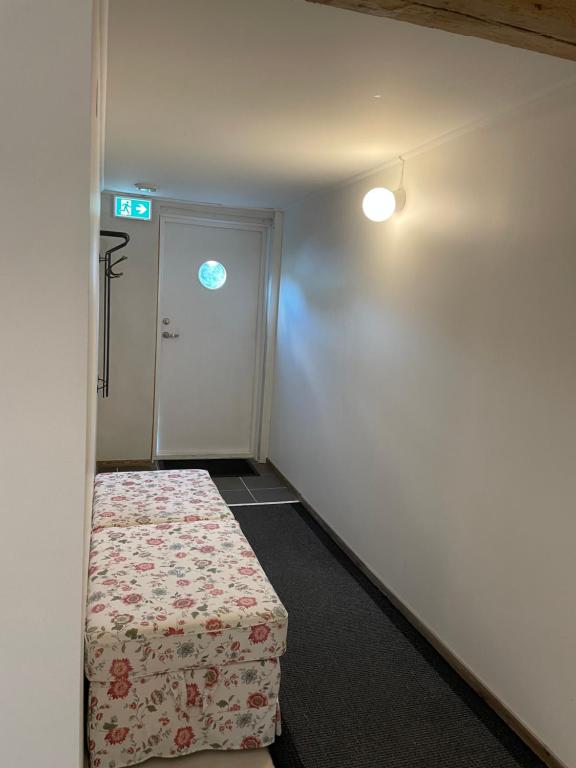 Postel nebo postele na pokoji v ubytování Hults-Boaryd Golf och B&B