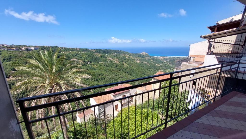 a balcony with a view of the ocean at B&B Biancamano in Maierà