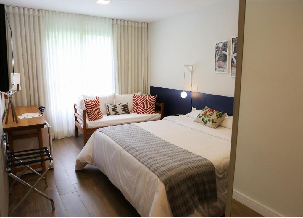 Cama ou camas em um quarto em Hotel do Bosque ECO Resort