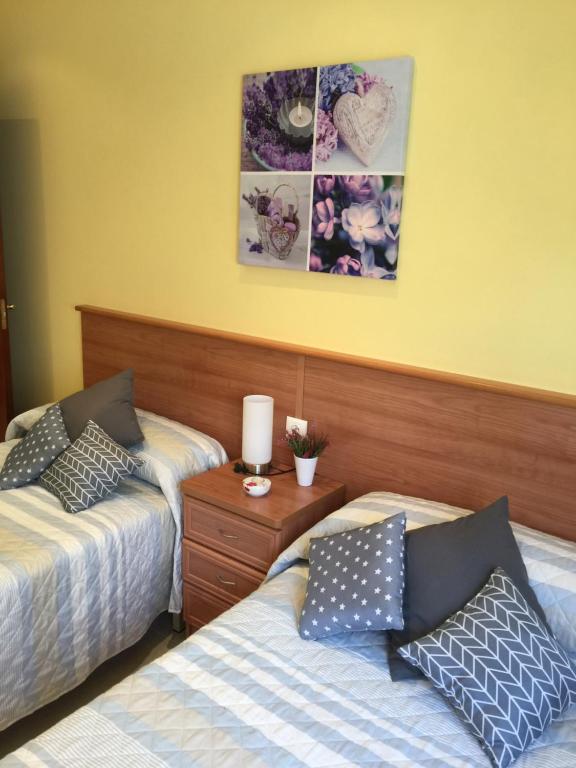 A bed or beds in a room at Apartamento Puerto de Foz