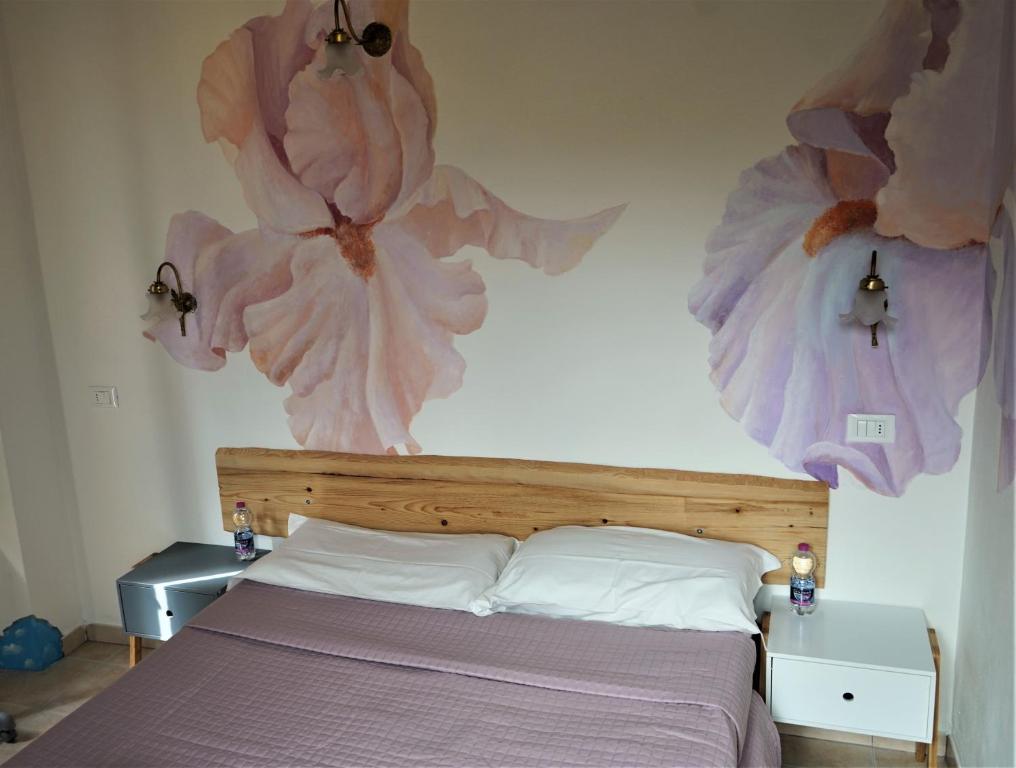 Postel nebo postele na pokoji v ubytování Hotel Baldo