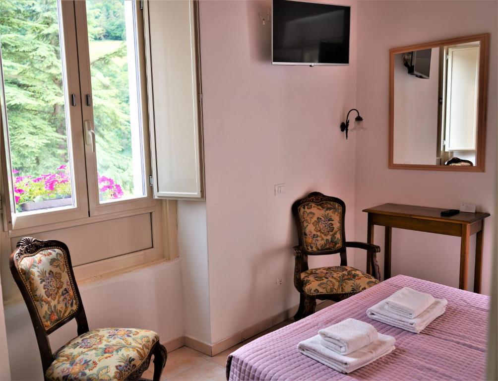TV a/nebo společenská místnost v ubytování Hotel Baldo