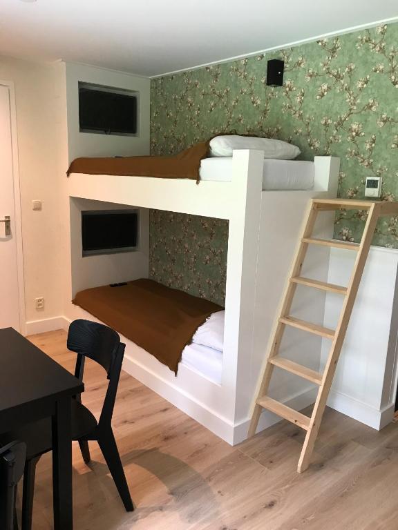 Kuchyň nebo kuchyňský kout v ubytování Hotel Jans