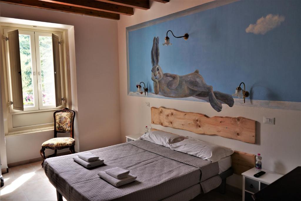 Postel nebo postele na pokoji v ubytování Hotel Baldo