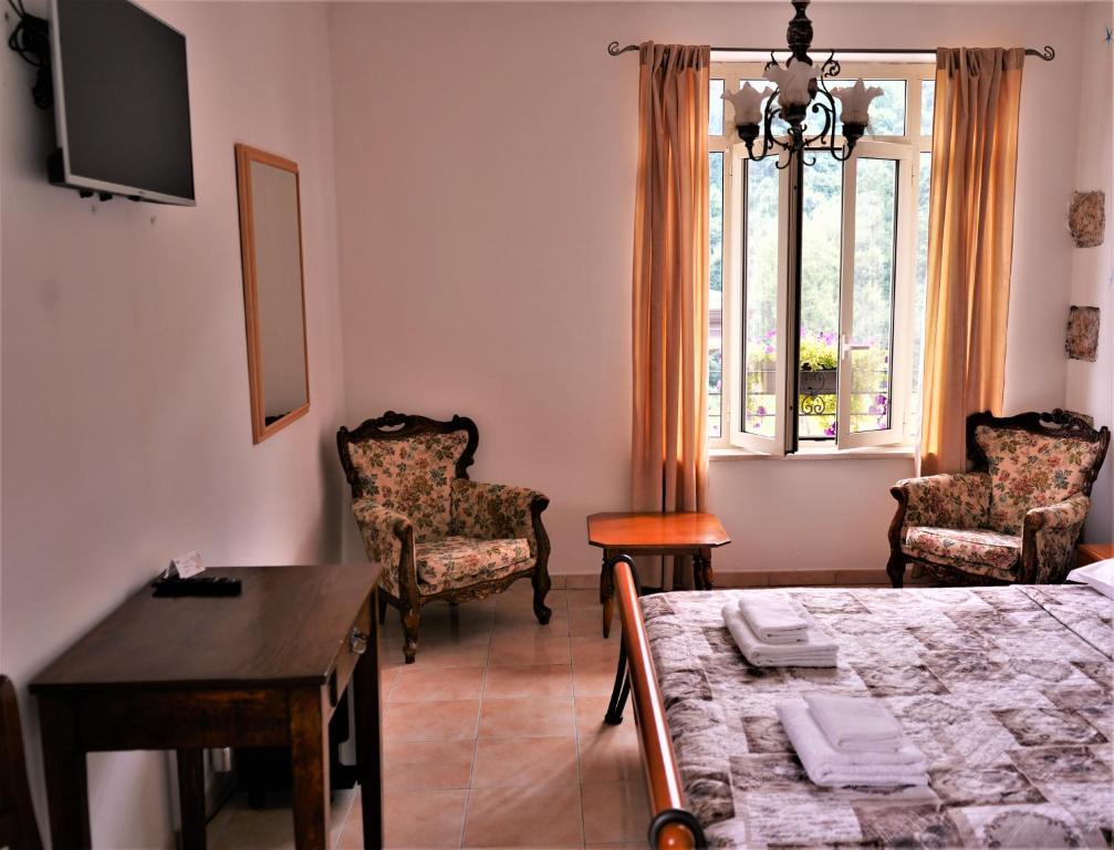 TV a/nebo společenská místnost v ubytování Hotel Baldo