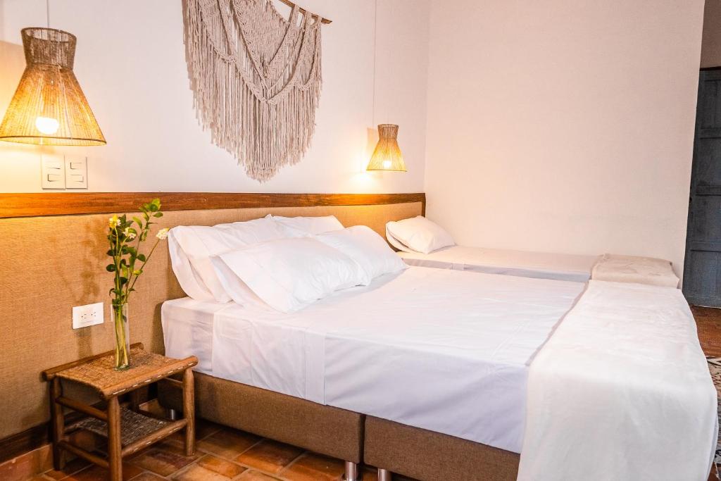 Voodi või voodid majutusasutuse Casa Guatí toas