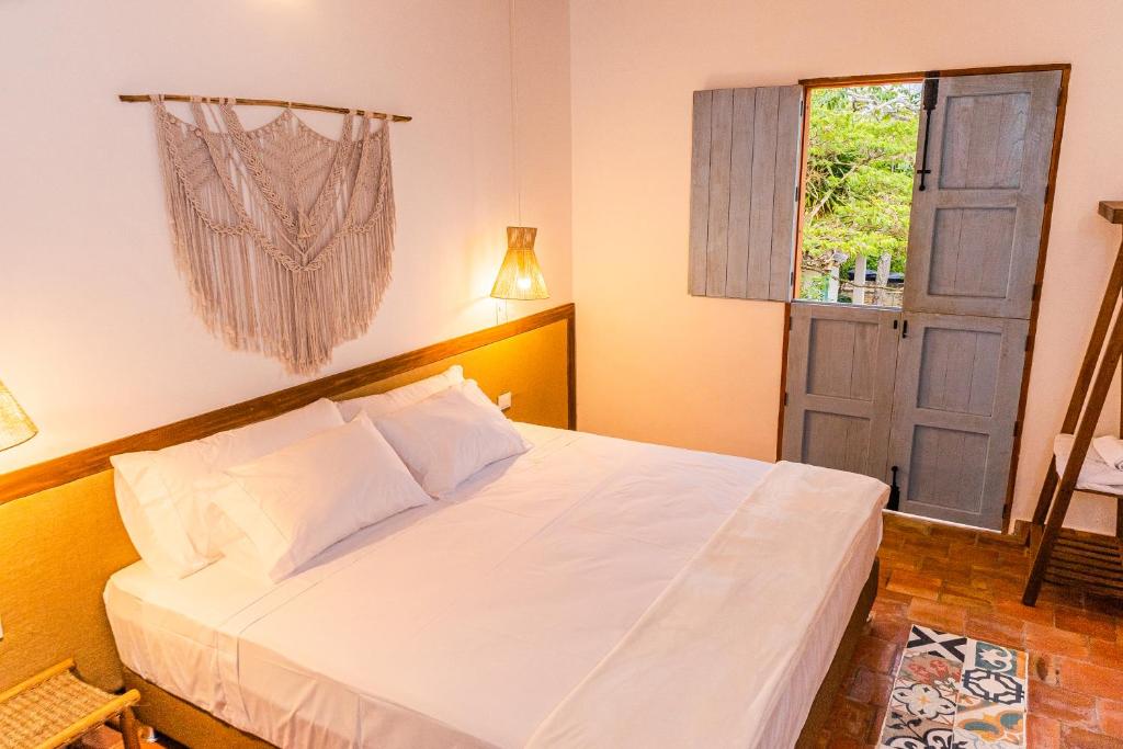 Voodi või voodid majutusasutuse Casa Guatí toas